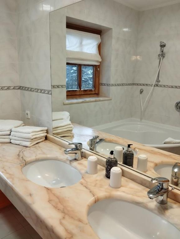 Kúpeľňa v ubytovaní Apartments Pfeffermühle - Kärnten Card im Sommer inklusive