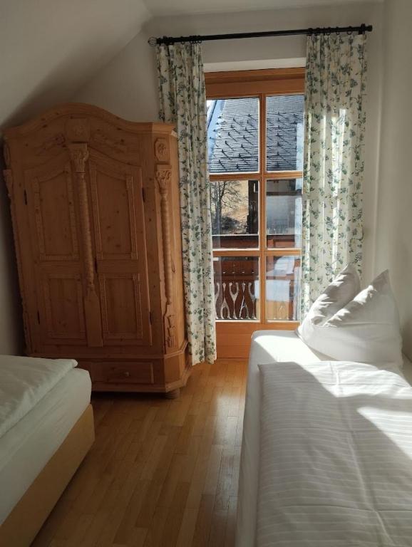 Posteľ alebo postele v izbe v ubytovaní Apartments Pfeffermühle - Kärnten Card im Sommer inklusive