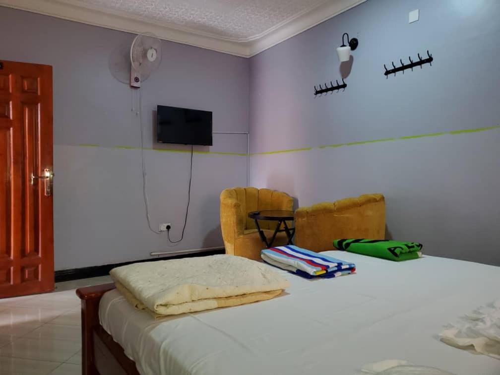 Postel nebo postele na pokoji v ubytování M3 Stella Hotel