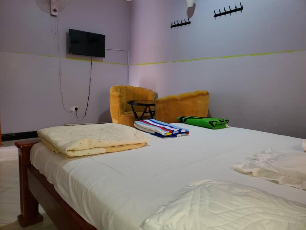 Postel nebo postele na pokoji v ubytování M3 Stella Hotel
