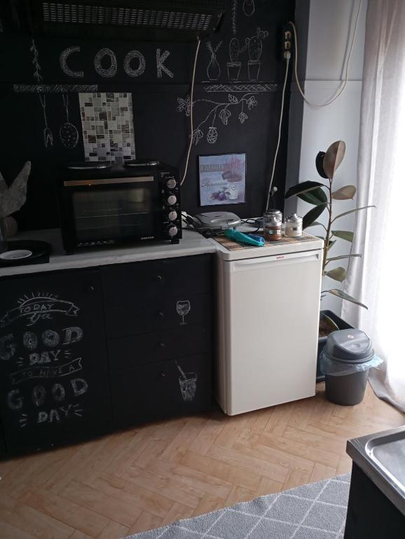 Kuchyň nebo kuchyňský kout v ubytování Comfy Studio