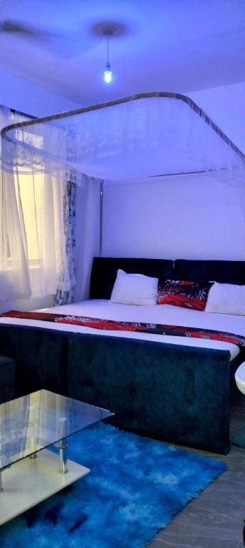 Postel nebo postele na pokoji v ubytování Kanacool studio Apartment