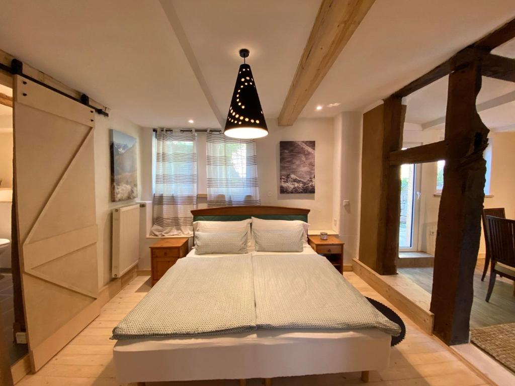 Postel nebo postele na pokoji v ubytování Landhaus Wahmbeck
