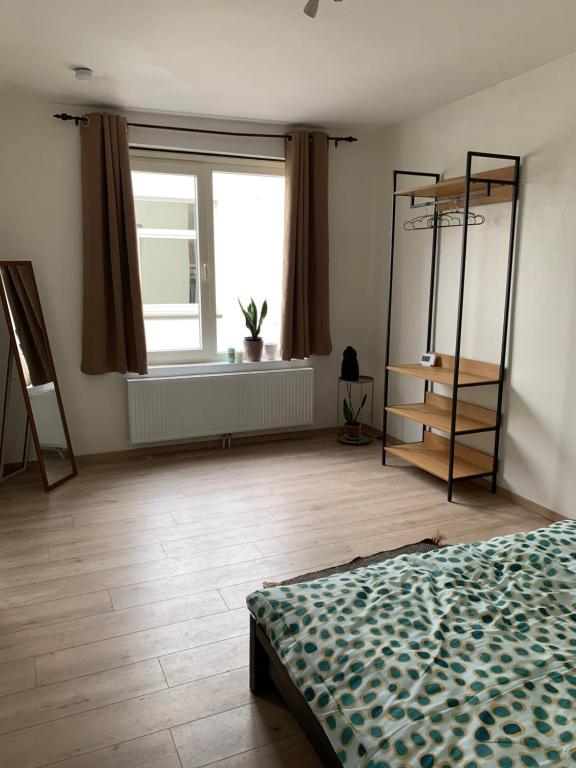 Postel nebo postele na pokoji v ubytování Guanto vakantiewoning