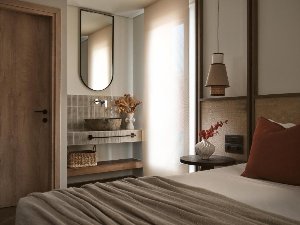 Voodi või voodid majutusasutuse Cactus Hotel toas