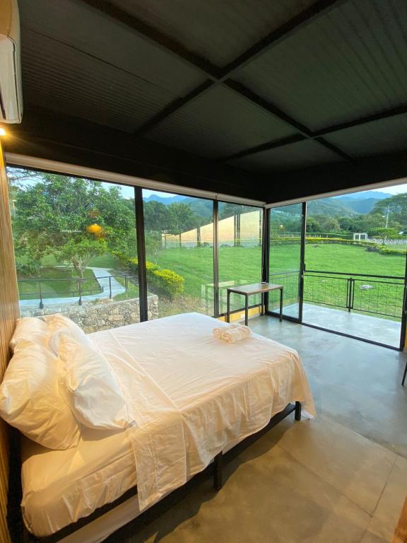 Postel nebo postele na pokoji v ubytování Finca Termópilas Rivera Huila RNT-92367