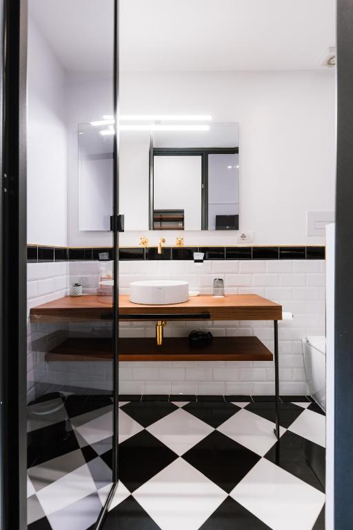 a bathroom with a sink and a mirror at Raggio di Sole in Maiori
