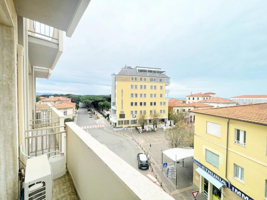 a view of a city street from a building at Appartamento AL SOLE a Marina di Cecina by Zoom In Earth in Marina di Cecina