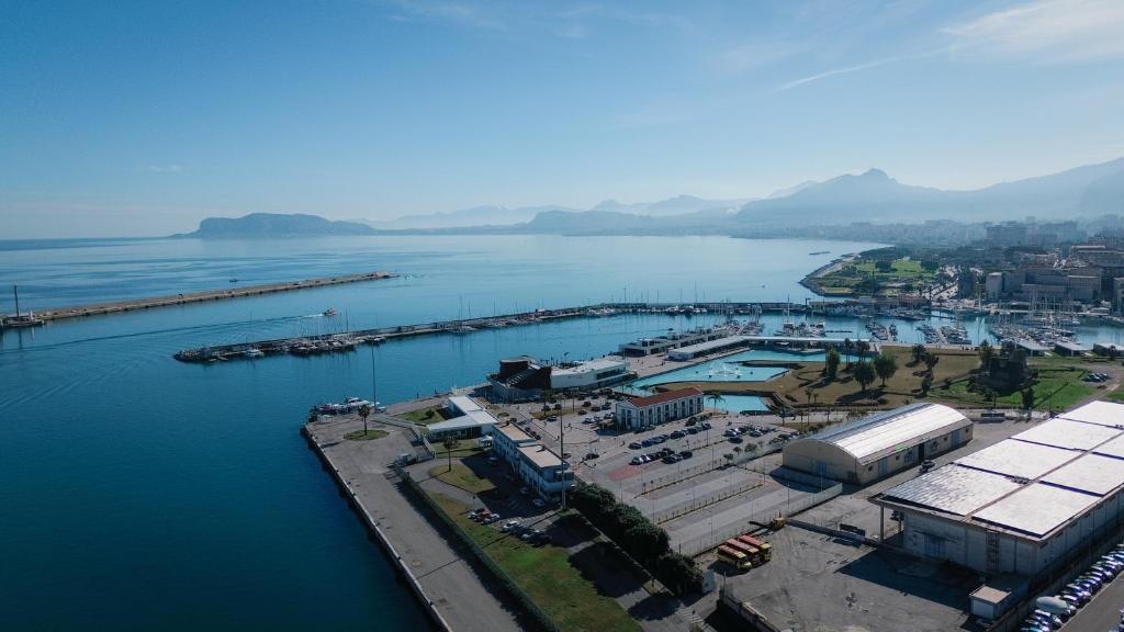 an aerial view of a harbor next to a body of water at Harbour Front - Luxury Rooms in Palermo