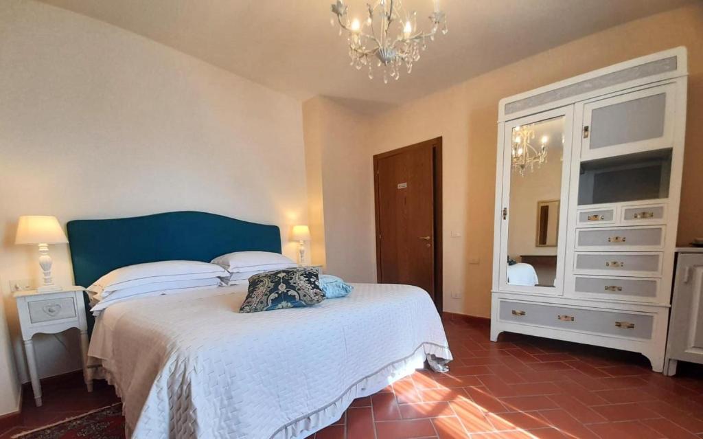 Postel nebo postele na pokoji v ubytování Agriturismo Poggio de Papi