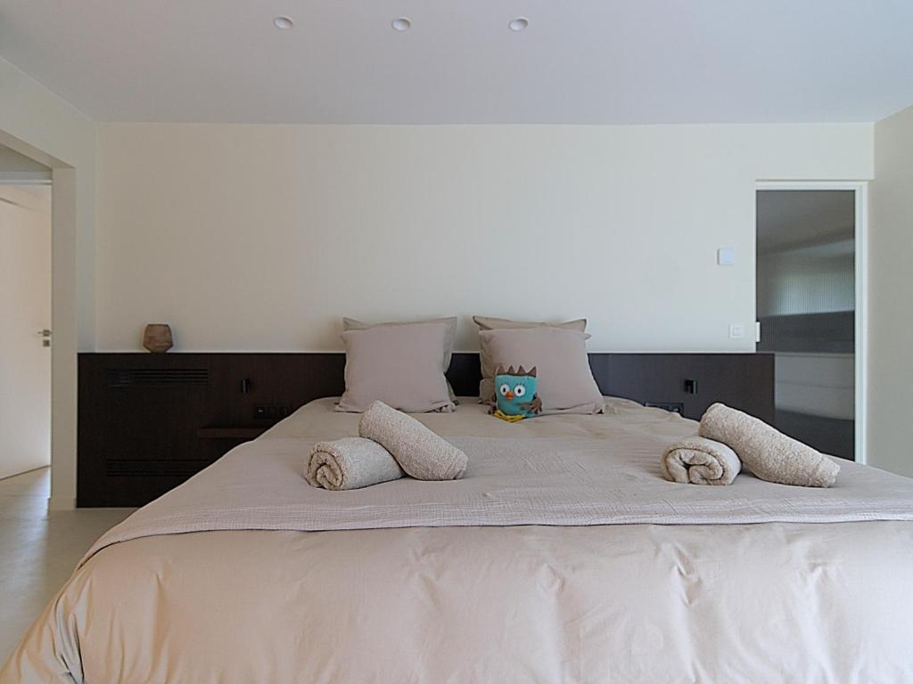 Postel nebo postele na pokoji v ubytování B&B De Alffarhoeve