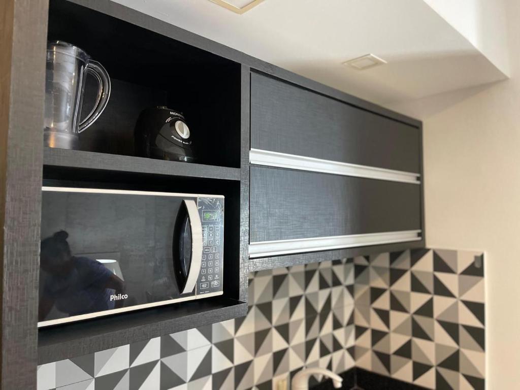 Køkken eller tekøkken på Suíte Premium de Alto Padrão I - Climatizado