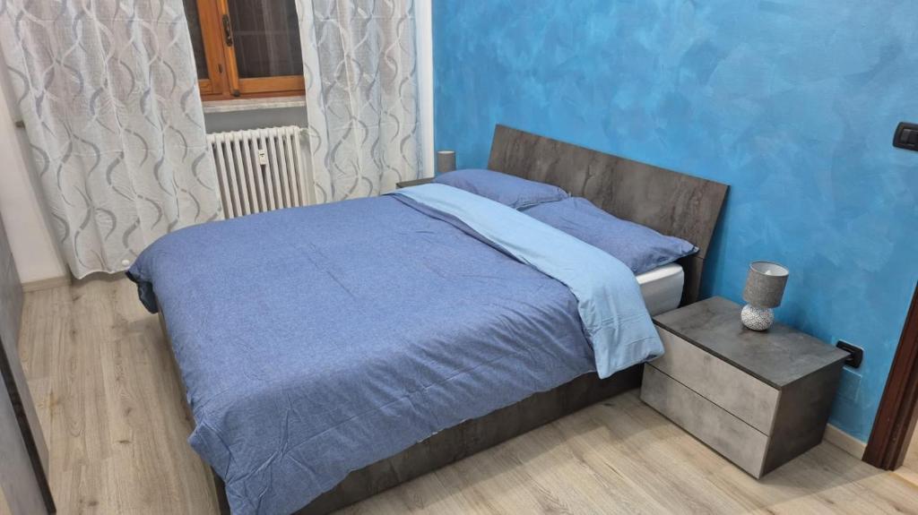 Postel nebo postele na pokoji v ubytování La Torretta Asti