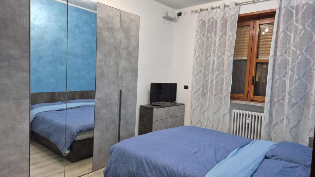Postel nebo postele na pokoji v ubytování La Torretta Asti