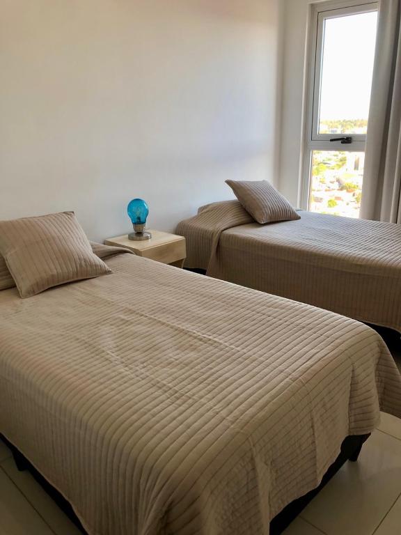 Postel nebo postele na pokoji v ubytování Güemes Premium, 2 dorm con Vista a las Sierras ALOHA #2