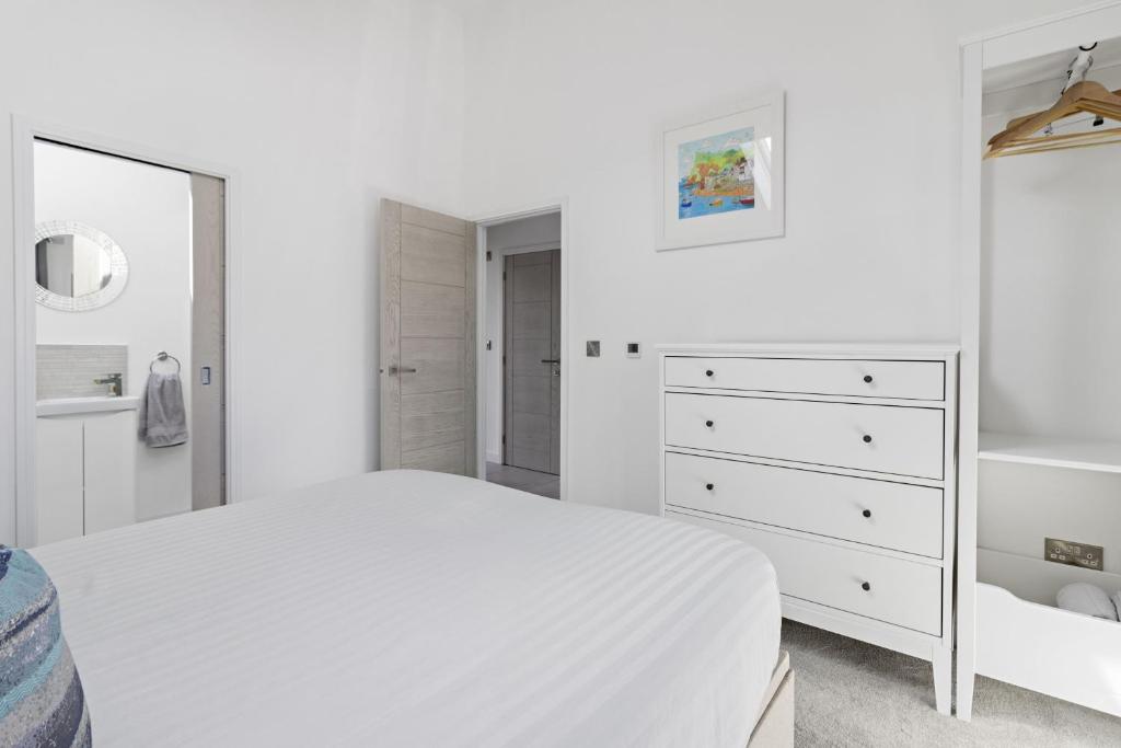 Ein Bett oder Betten in einem Zimmer der Unterkunft Teign View, Grand Banks