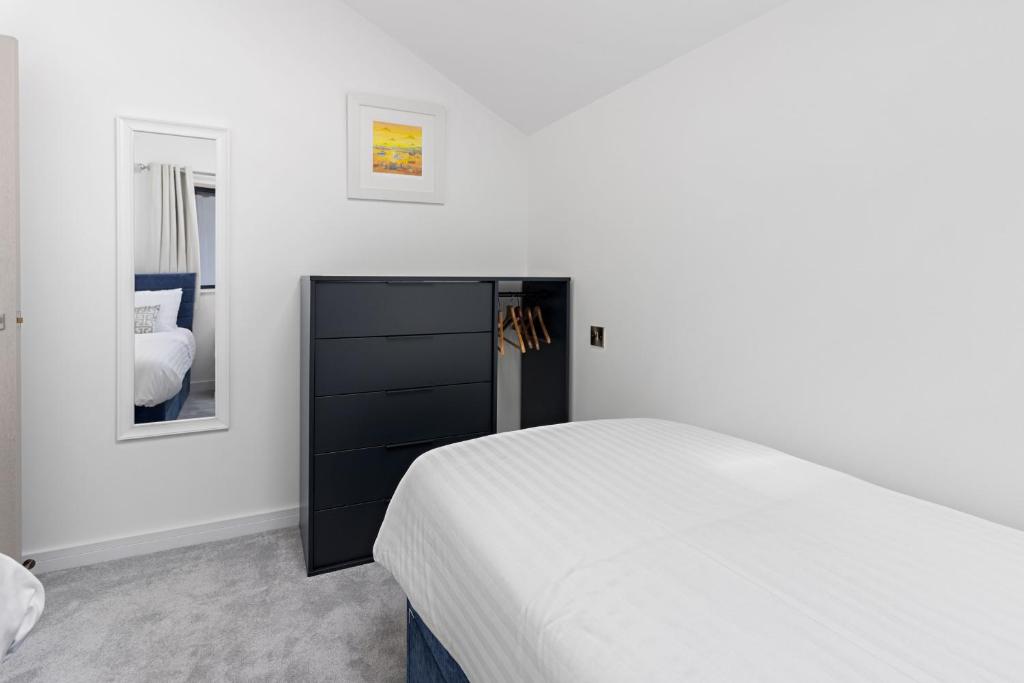 Ein Bett oder Betten in einem Zimmer der Unterkunft Teign View, Grand Banks