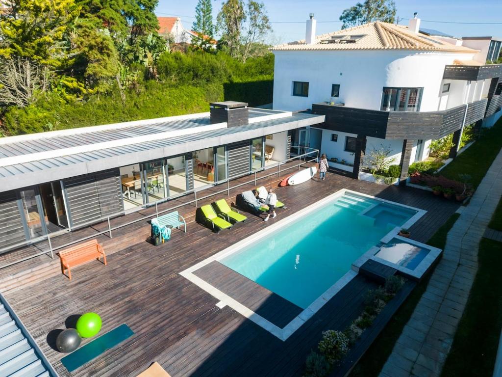 an aerial view of a house with a swimming pool at Villa Lapax by Ericeira Property in Ericeira