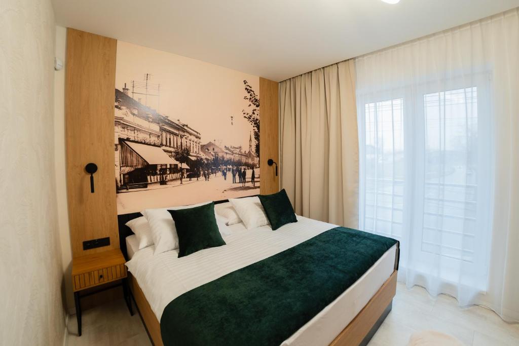 Postel nebo postele na pokoji v ubytování LAMBERT Residences