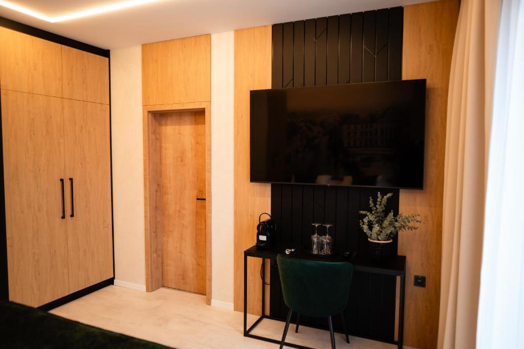 TV a/nebo společenská místnost v ubytování LAMBERT Residences