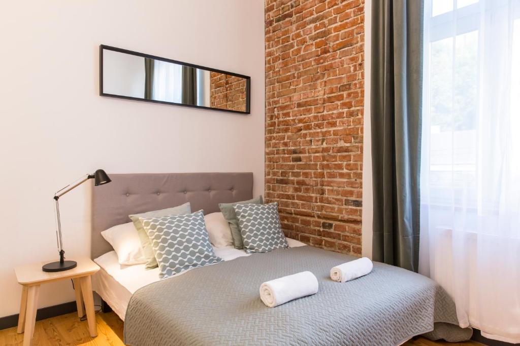Posteľ alebo postele v izbe v ubytovaní 19Rooms
