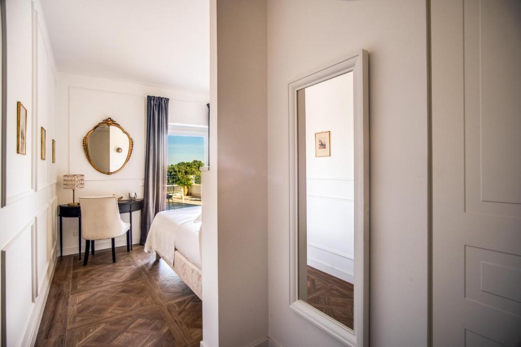 Postel nebo postele na pokoji v ubytování Vigna Caio Relais & Spa