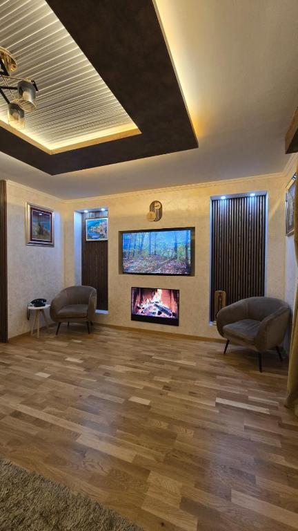 TV a/nebo společenská místnost v ubytování Hotel Mažijanik