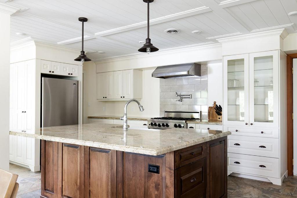 a kitchen with a sink and a counter top at Fairy Bay Lakehouse in Huntsville