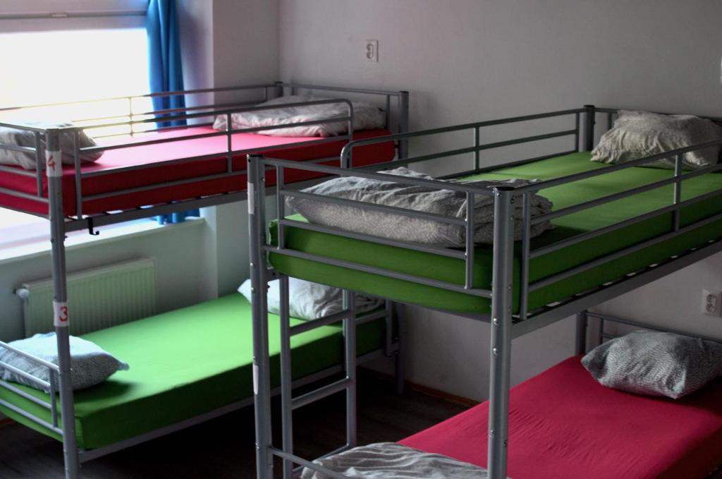 Postel nebo postele na pokoji v ubytování Urban Elephants Hostel