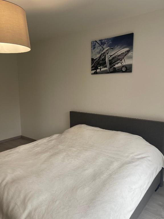 Postel nebo postele na pokoji v ubytování Lake Geneva
