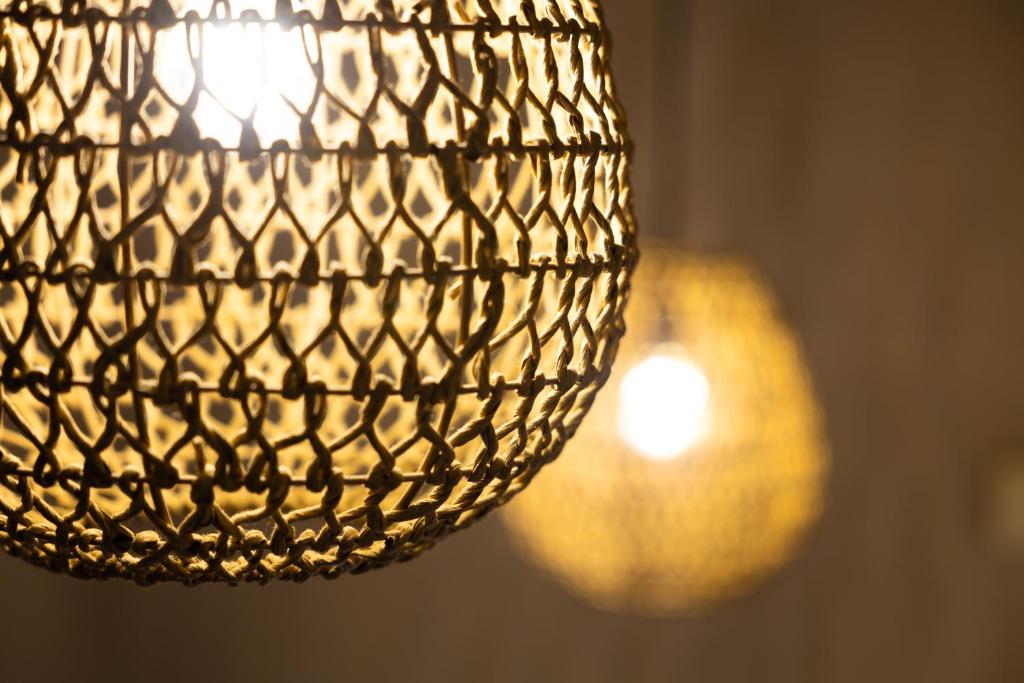 a close up of a chandelier at Haraki Village in Haraki
