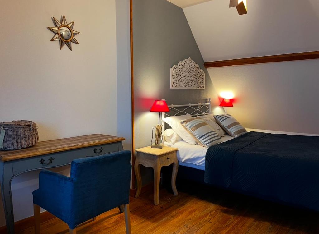 Postel nebo postele na pokoji v ubytování Les Transats Chambre et appartements Face à la mer