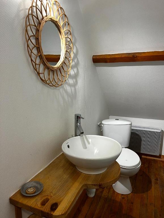 Koupelna v ubytování Les Transats Chambre et appartements Face à la mer