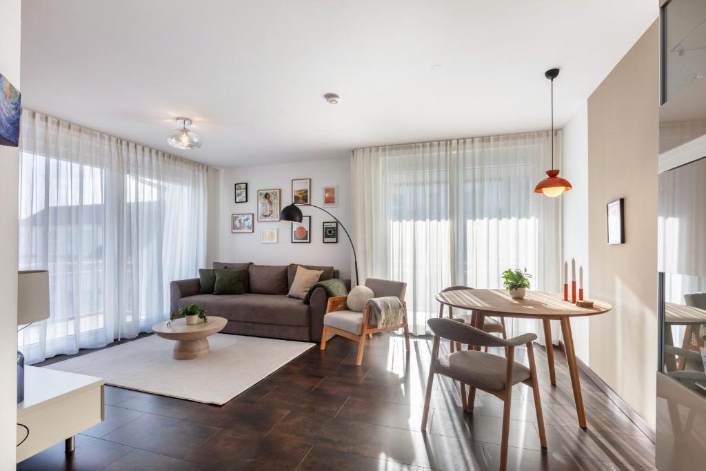 Posezení v ubytování Ferienwohnung LINNEA - Bad Bellingen