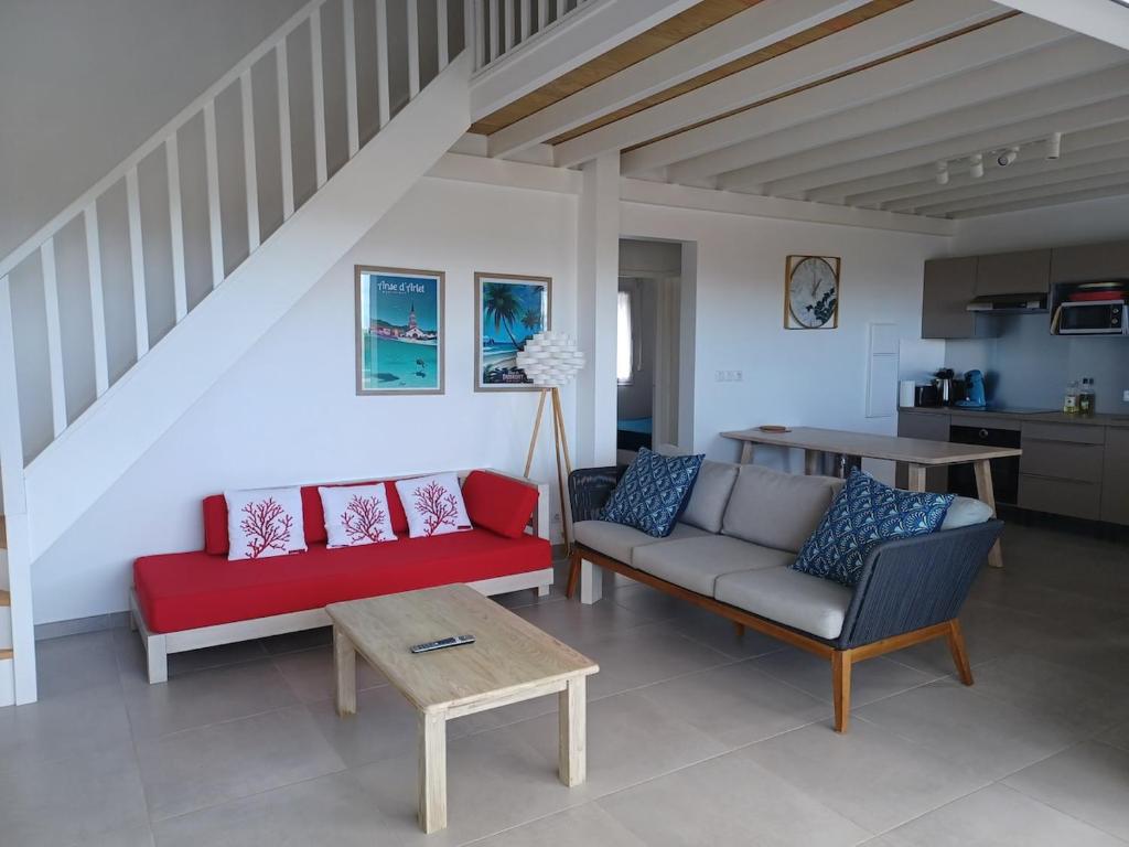 Posezení v ubytování Appartement neuf a 150 metres de la mer wifi