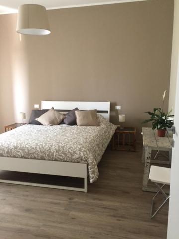 Postel nebo postele na pokoji v ubytování B&B L'Airone