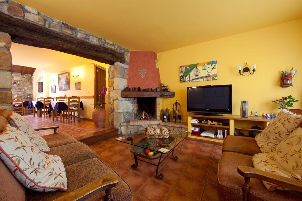 TV a/nebo společenská místnost v ubytování Hotel Matsa B&B