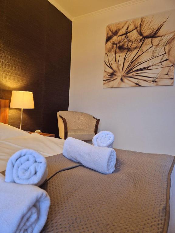 Postel nebo postele na pokoji v ubytování B&B Penzión Magura
