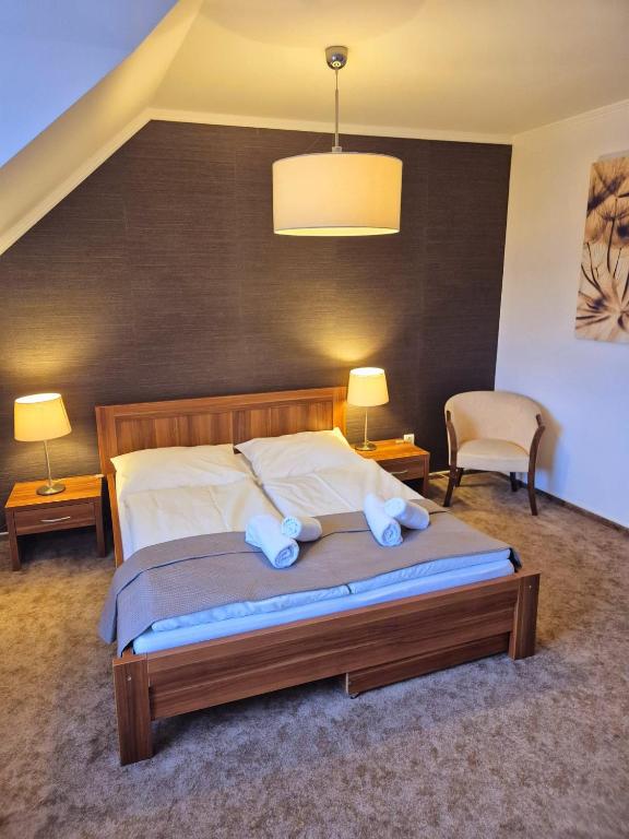 Postel nebo postele na pokoji v ubytování B&B Penzión Magura