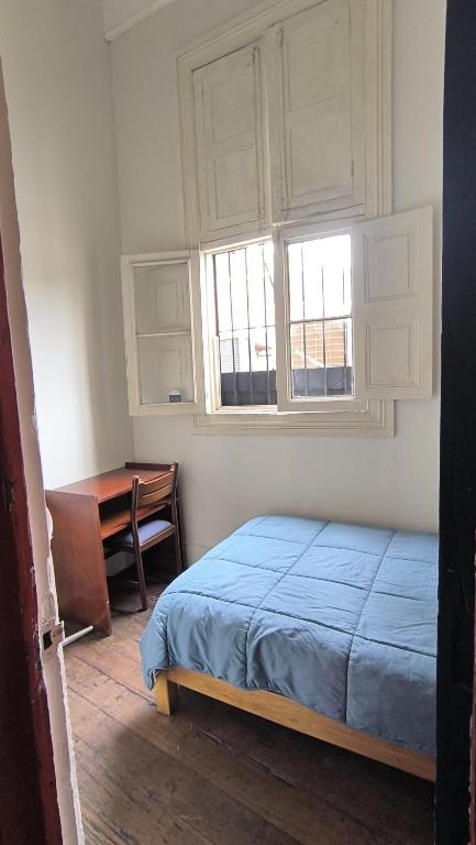 Letto o letti in una camera di Flying Dog Hostel