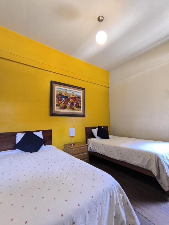 Letto o letti in una camera di Flying Dog Hostel