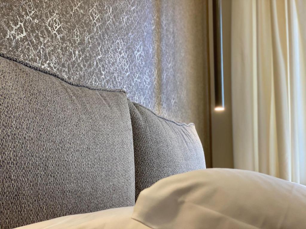 Postel nebo postele na pokoji v ubytování Le Due Torri ROOMS
