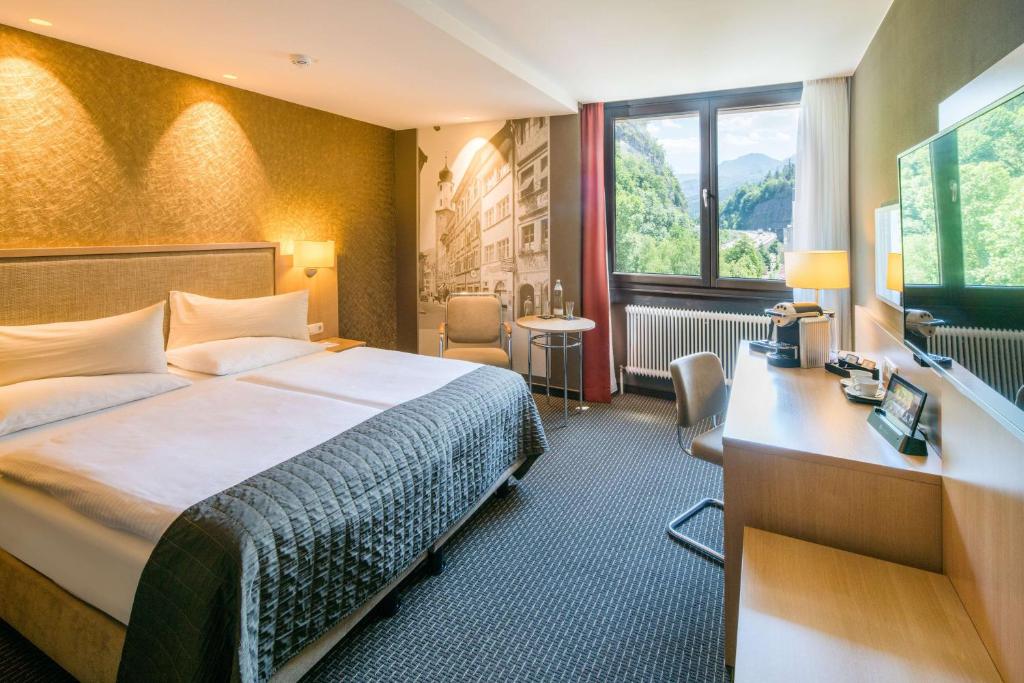 Postel nebo postele na pokoji v ubytování Best Western Premier Central Hotel Leonhard