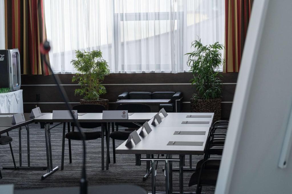Een restaurant of ander eetgelegenheid bij Best Western Plus Plaza Hotel Graz