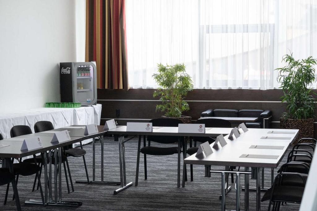 Een restaurant of ander eetgelegenheid bij Best Western Plus Plaza Hotel Graz