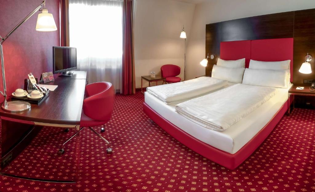 Postel nebo postele na pokoji v ubytování Best Western Plaza Hotel Wels