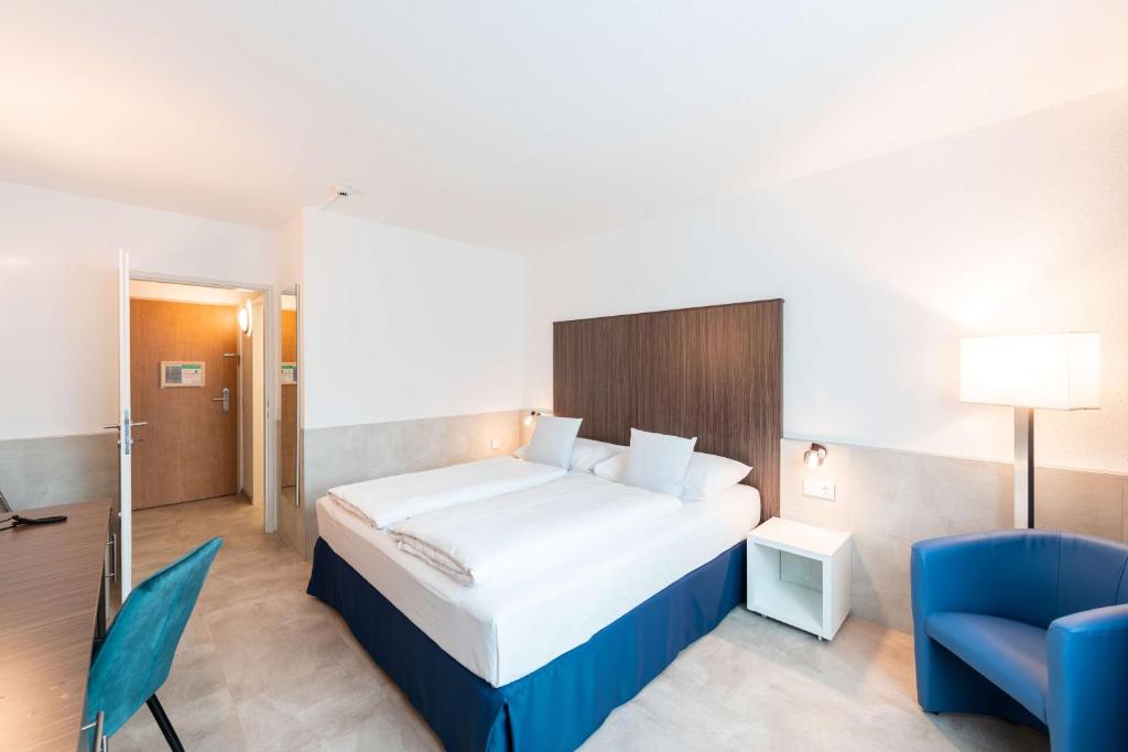 Postel nebo postele na pokoji v ubytování Best Western Smart Hotel