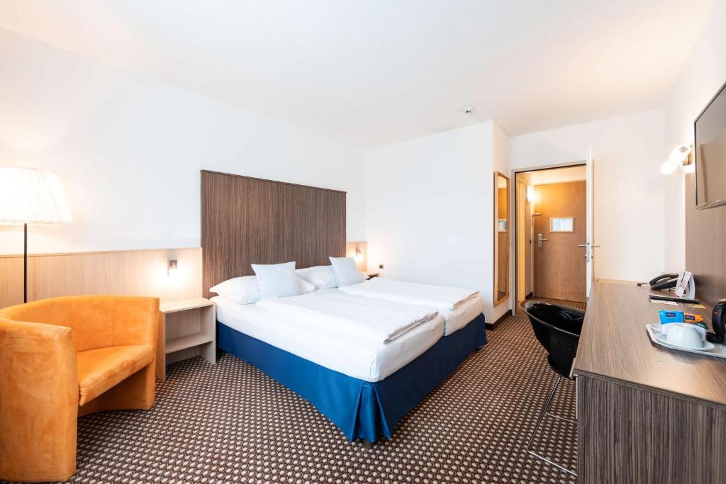 Postel nebo postele na pokoji v ubytování Best Western Smart Hotel