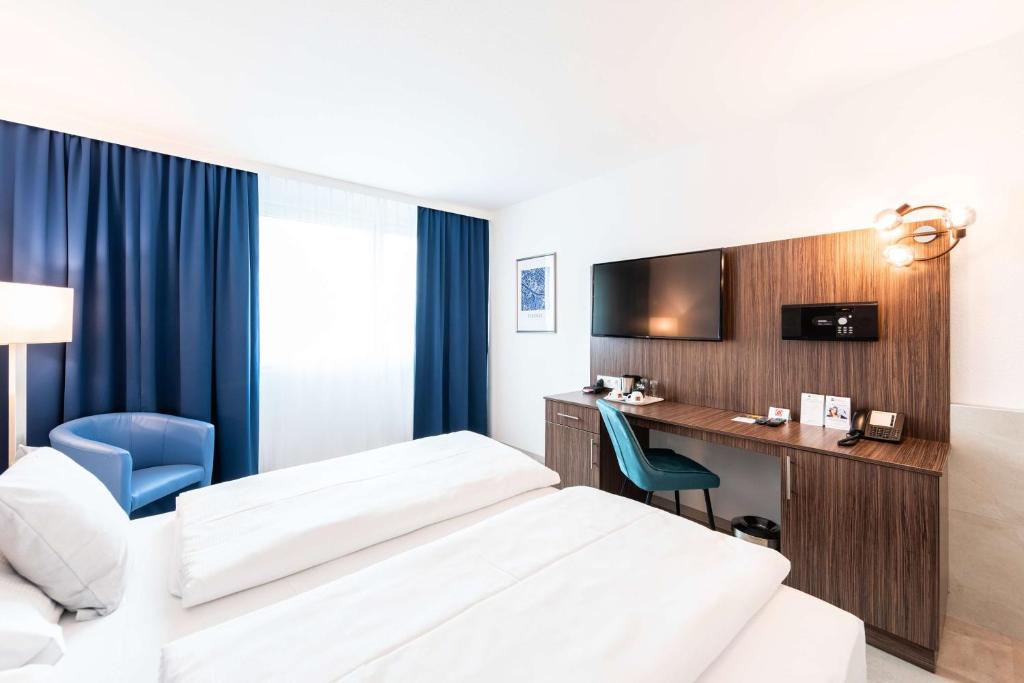 Postel nebo postele na pokoji v ubytování Best Western Smart Hotel