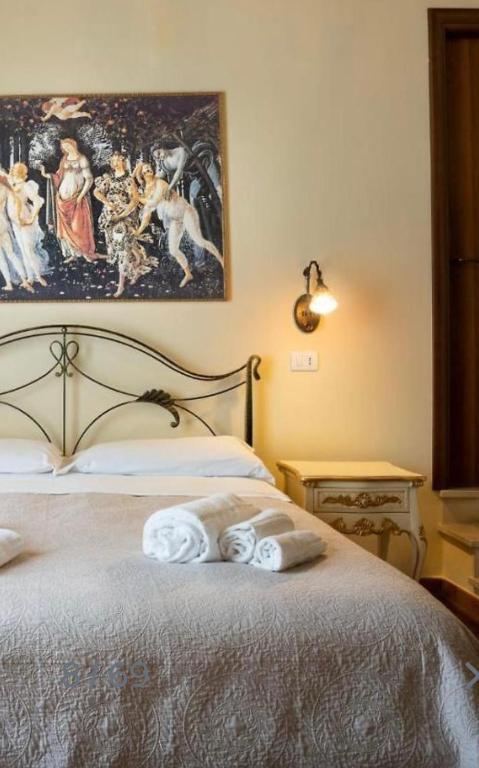 Postel nebo postele na pokoji v ubytování B&B Ares Charme